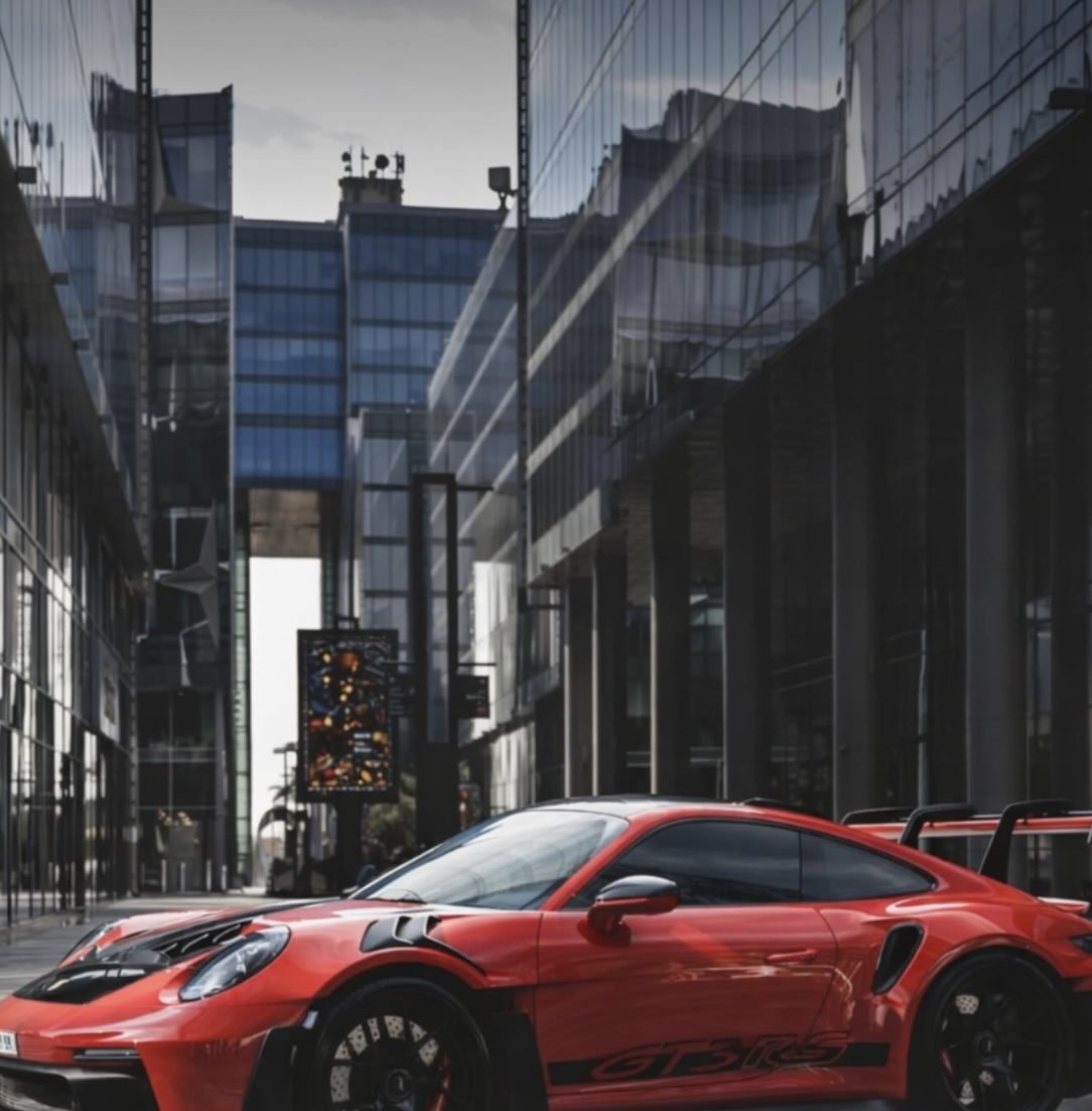 Red Porsche 911 GT3 RS with Weissach Package, available for rent from YAZ Car Rental