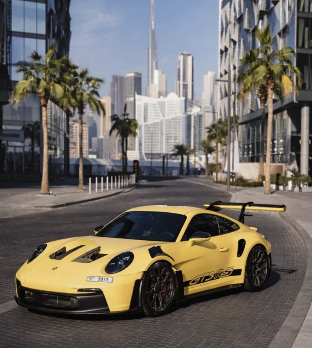 Yellow Porsche 911 GT3 RS, available for rent from YAZ Car Rental